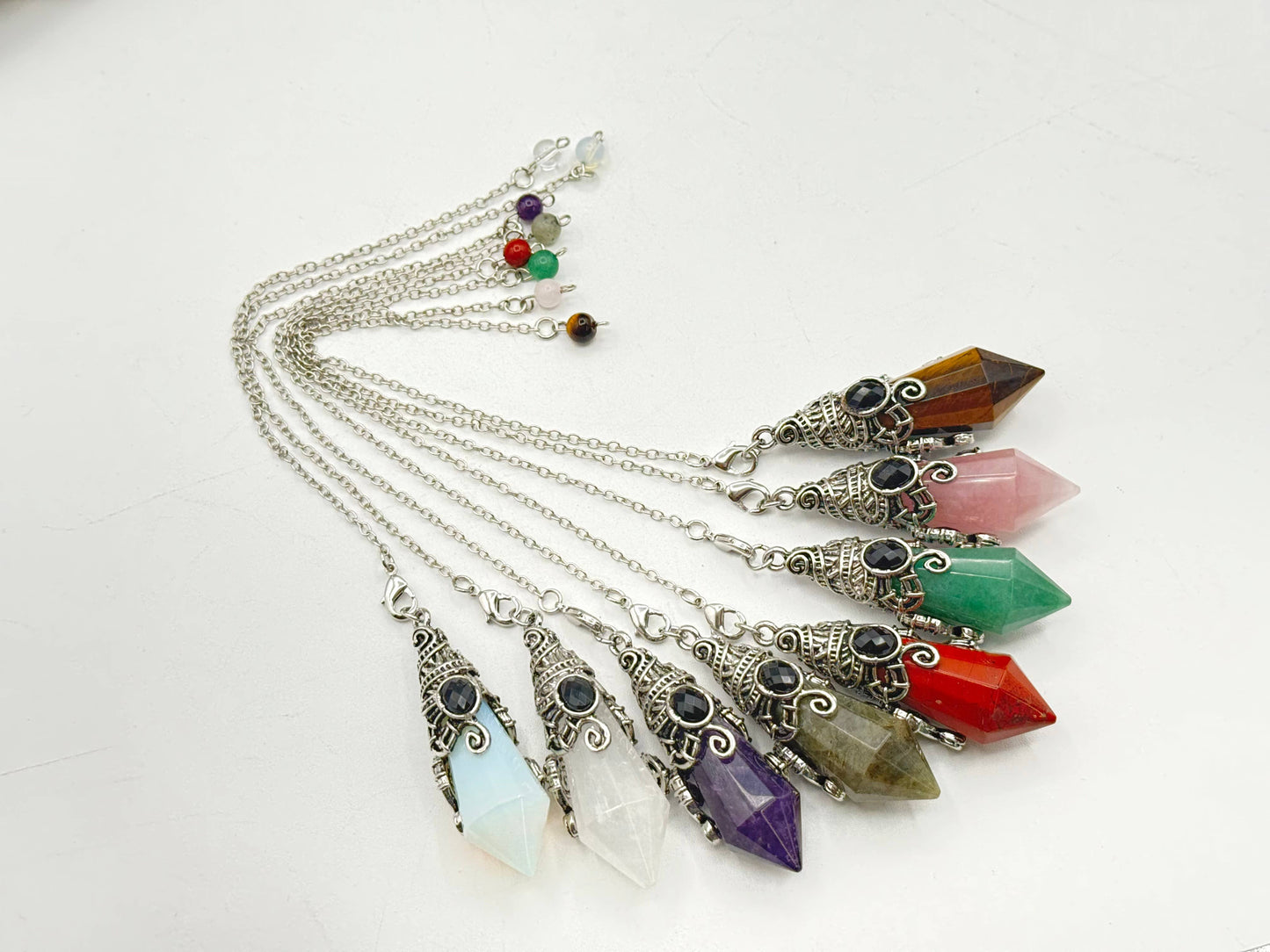 Crystal Quartz 12 Faceted Antique Silver Detailing Pendulum